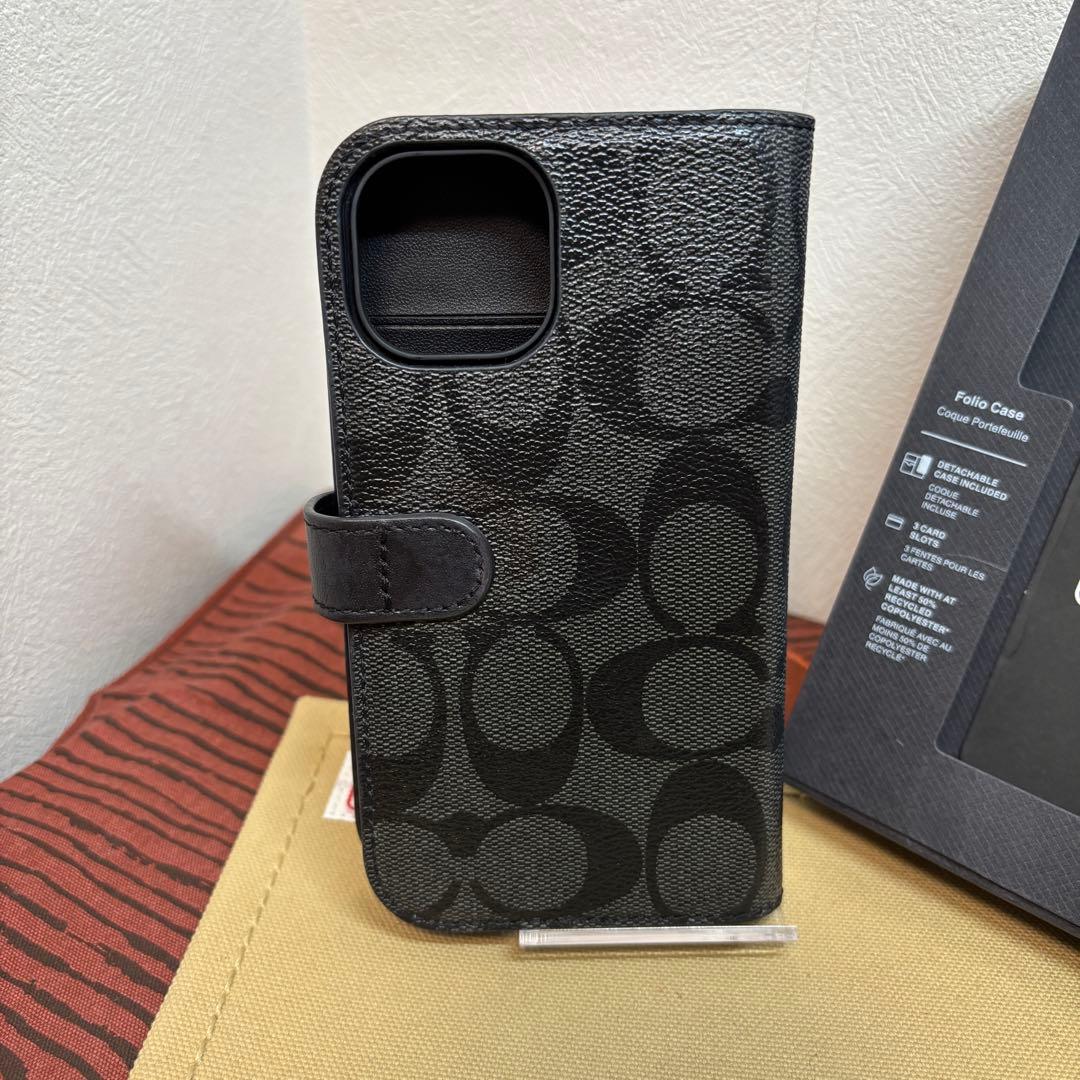 美品 COACH コーチ IPHONE15 フォリオ・シグネチャー キャンバス