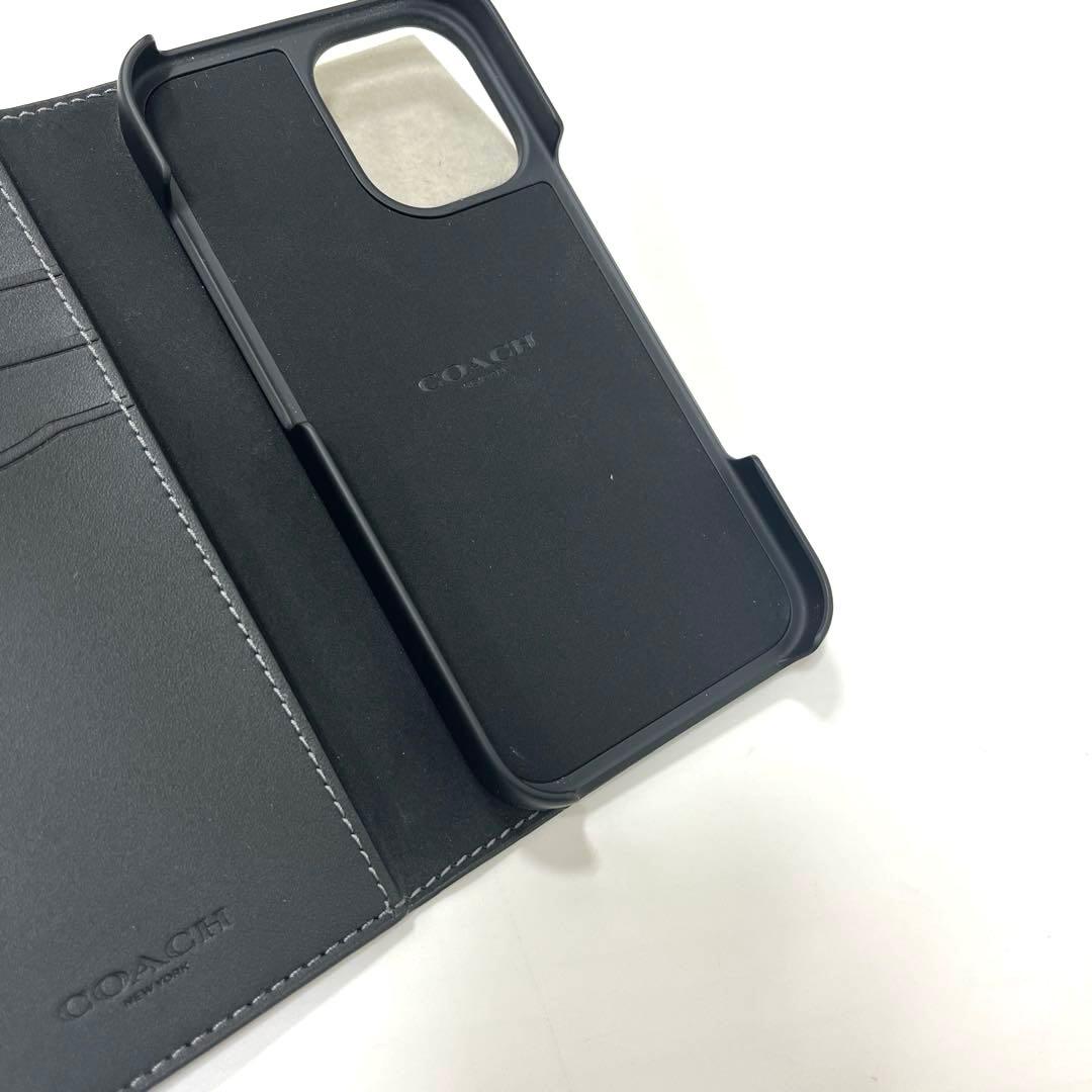 【美品】コーチ シグネチャー柄 iPhone16用手帳型カバー ブラック