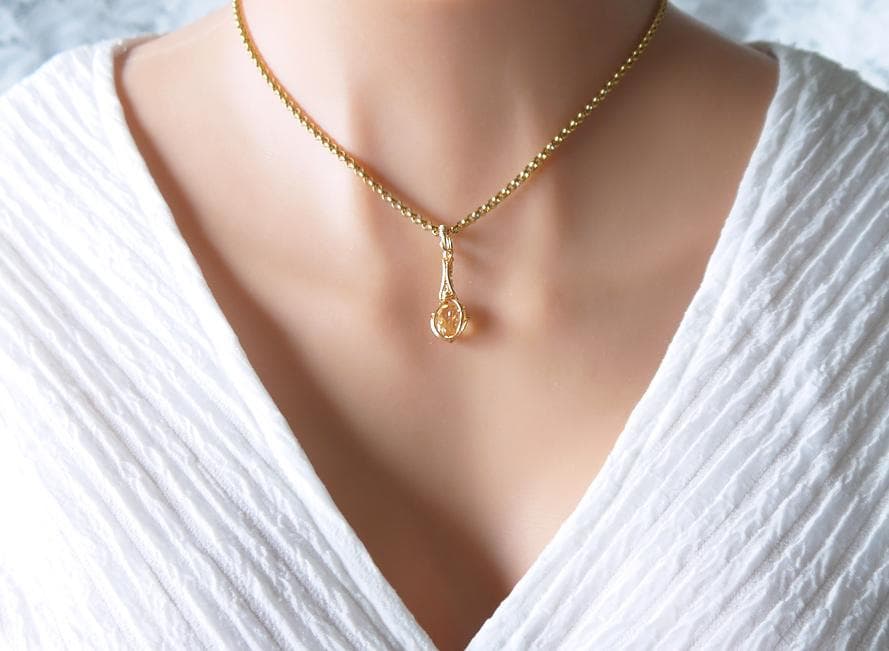 宝石質 インペリアルトパーズ ペンダントトップ◇