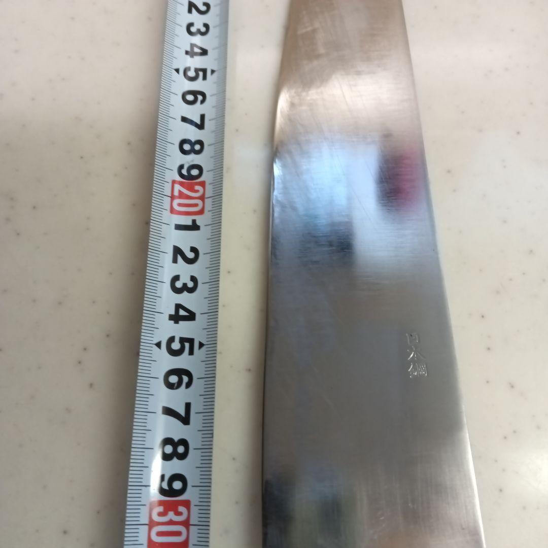 刃渡り約３１cmの牛刀　龍王