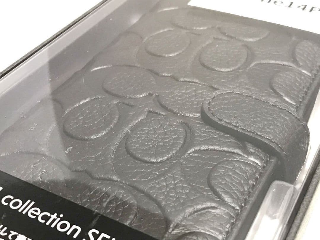 新品コーチ iPhone アイフォン 14 Plus エンボス R22C052K