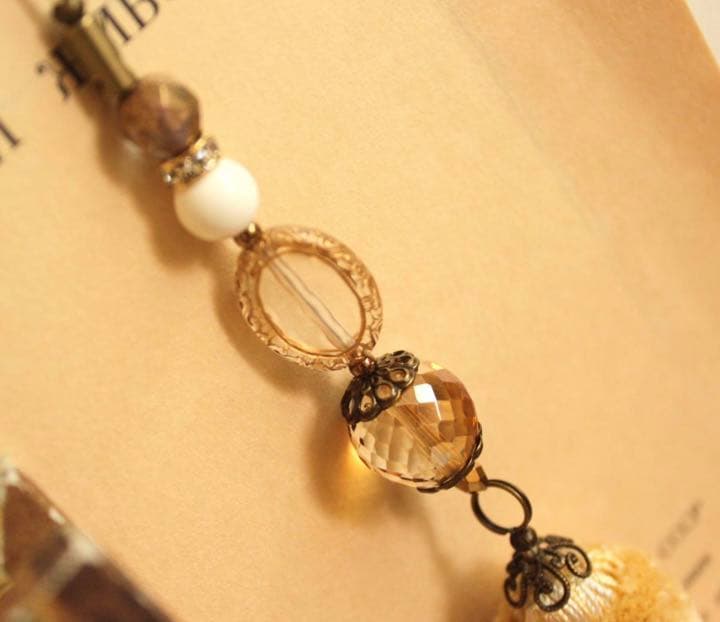 エキゾチック　タッセル　ストラップ　スワロフスキークリスタル等