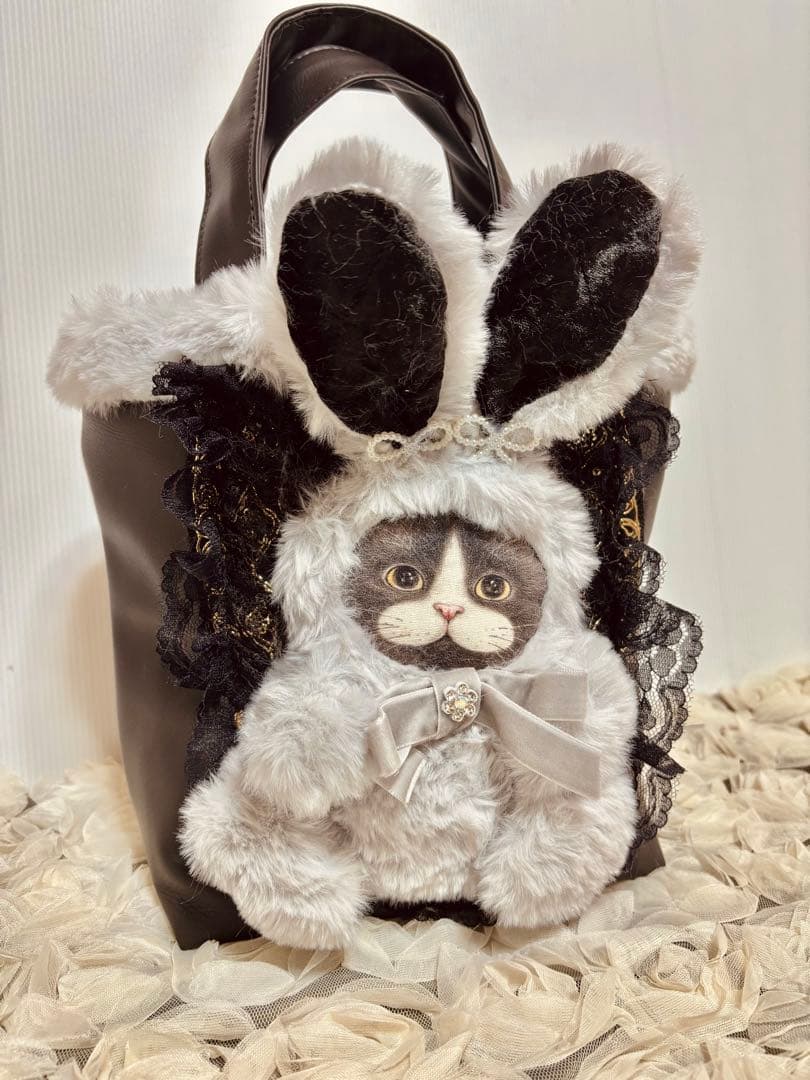 コヤンイサムチョン　フェイクレザーブラックのトートバッグ