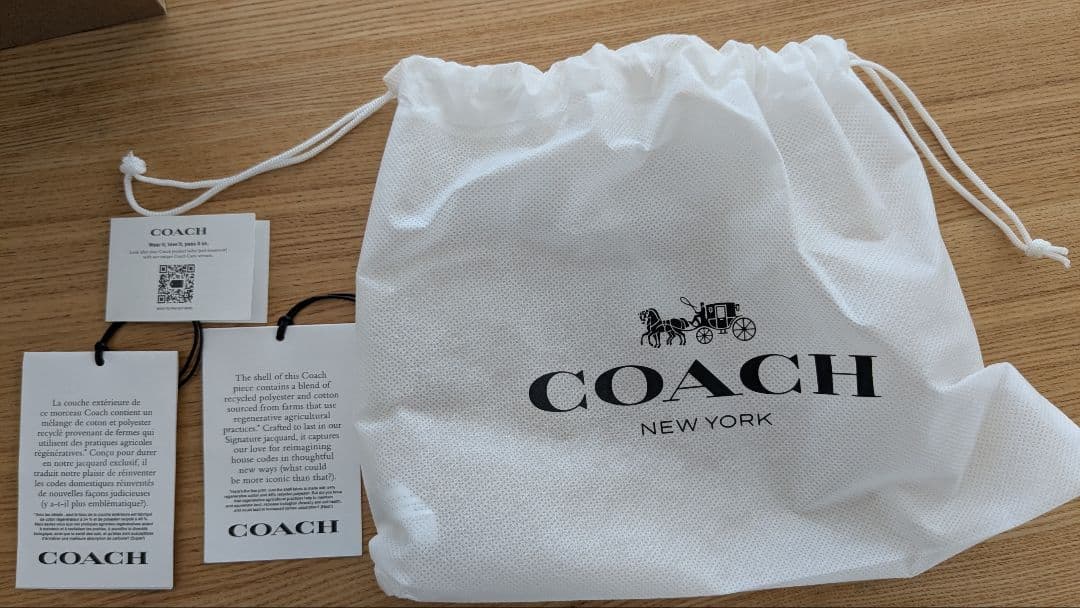 COACH ブラック 長財布 ストラップ付き