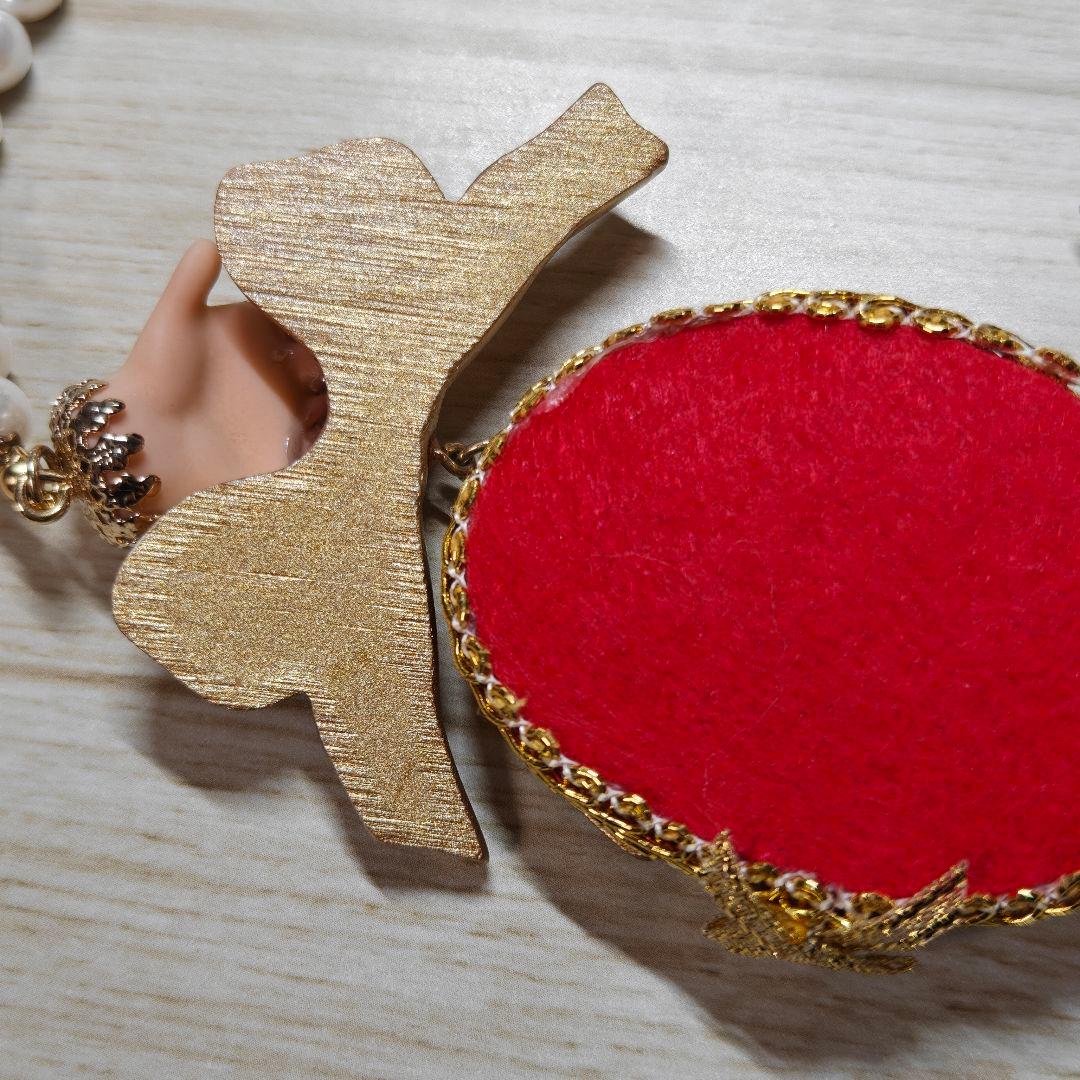 Unlogical Poemユニークな人形モチーフ ネックレス