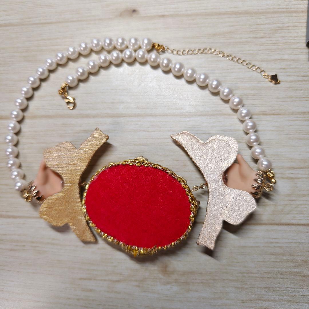 Unlogical Poemユニークな人形モチーフ ネックレス