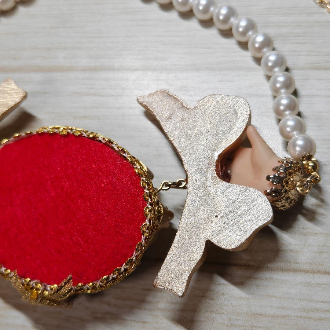 Unlogical Poemユニークな人形モチーフ ネックレス