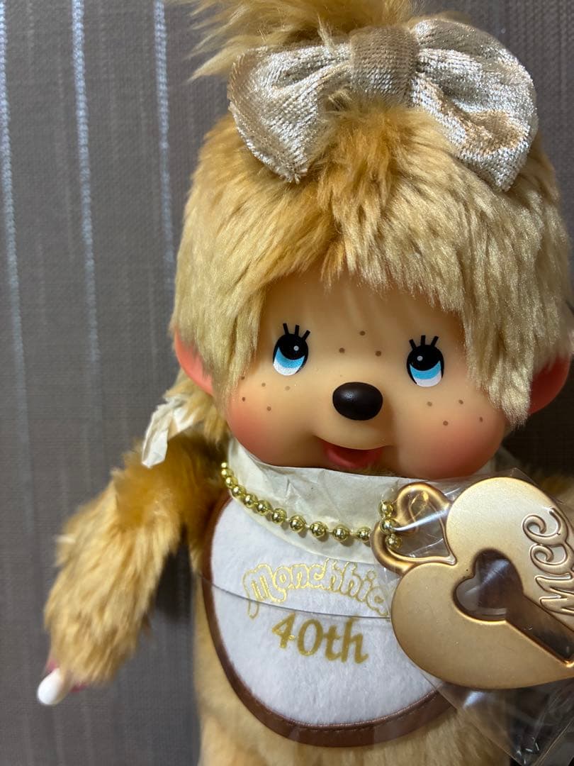 2014年　新品未使用モンチッチ 40周年限定 ゴールドS（女）希少　ブルーアイ