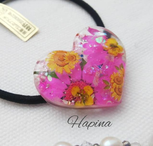 ピンクフラワーとひまわりハートレジンヘアゴム ポニーフック変更可能。