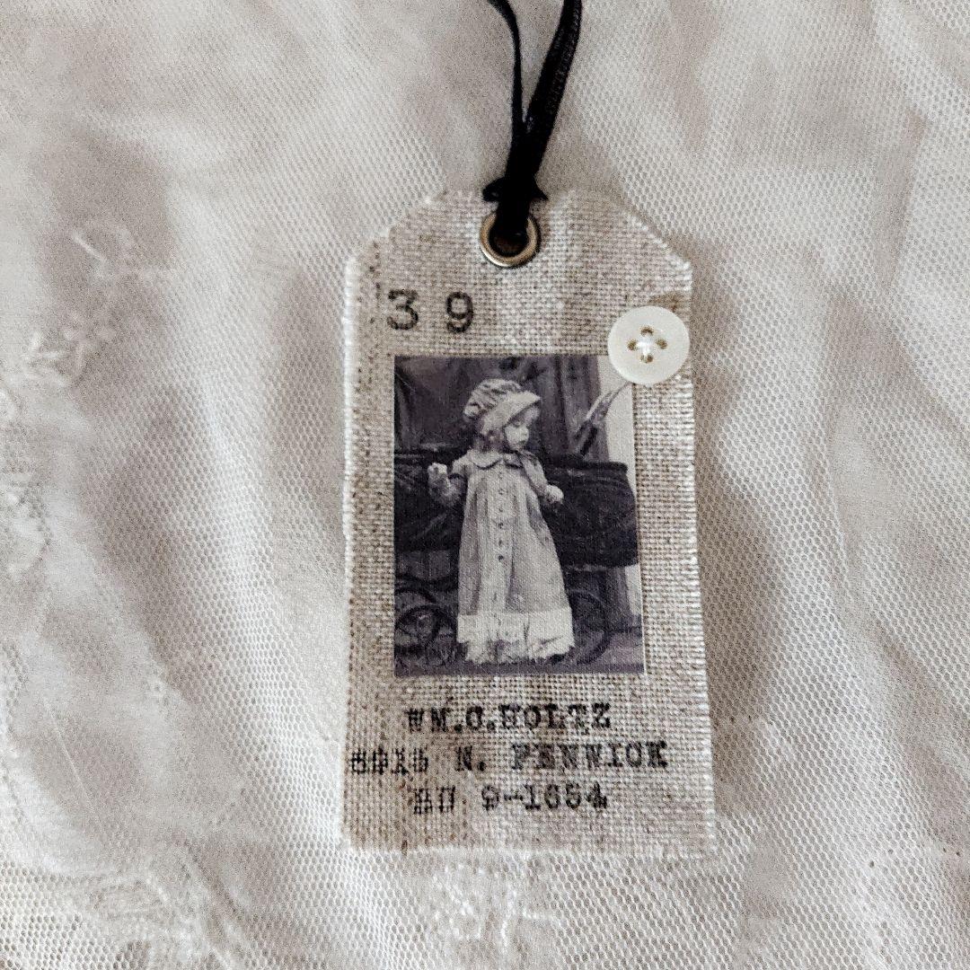 K212    ＊アンティーク少女の布タグ