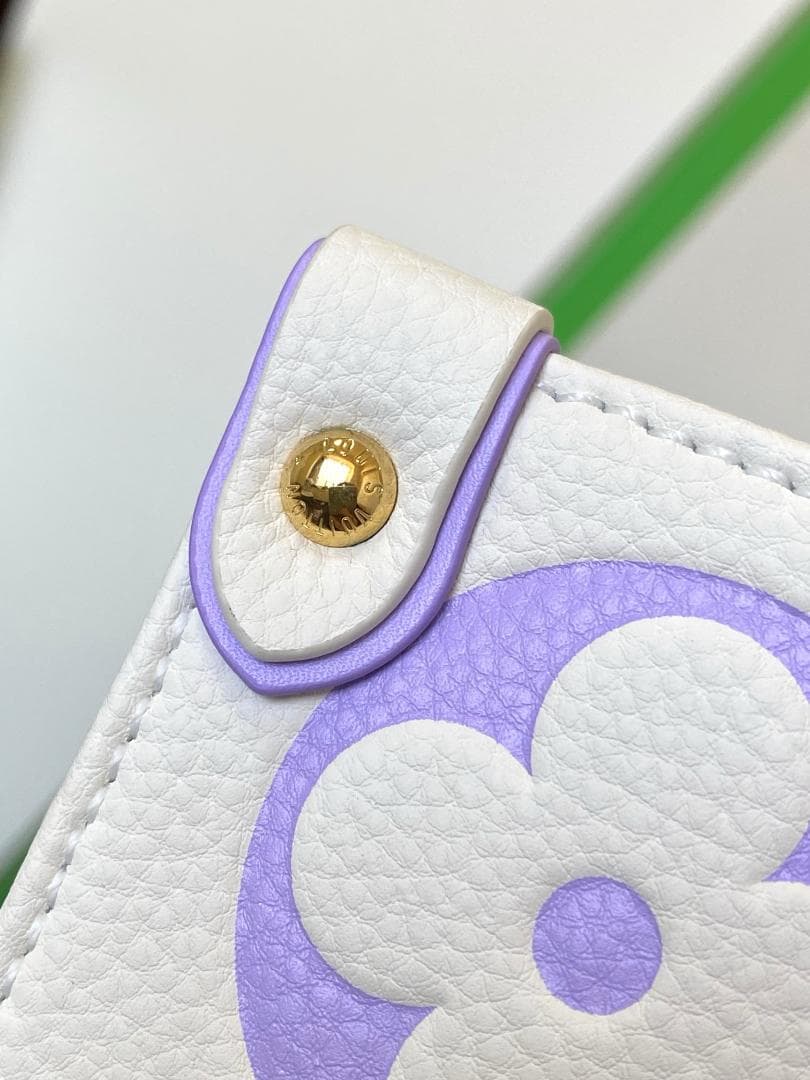 ホワイトレザーバッグ M45595