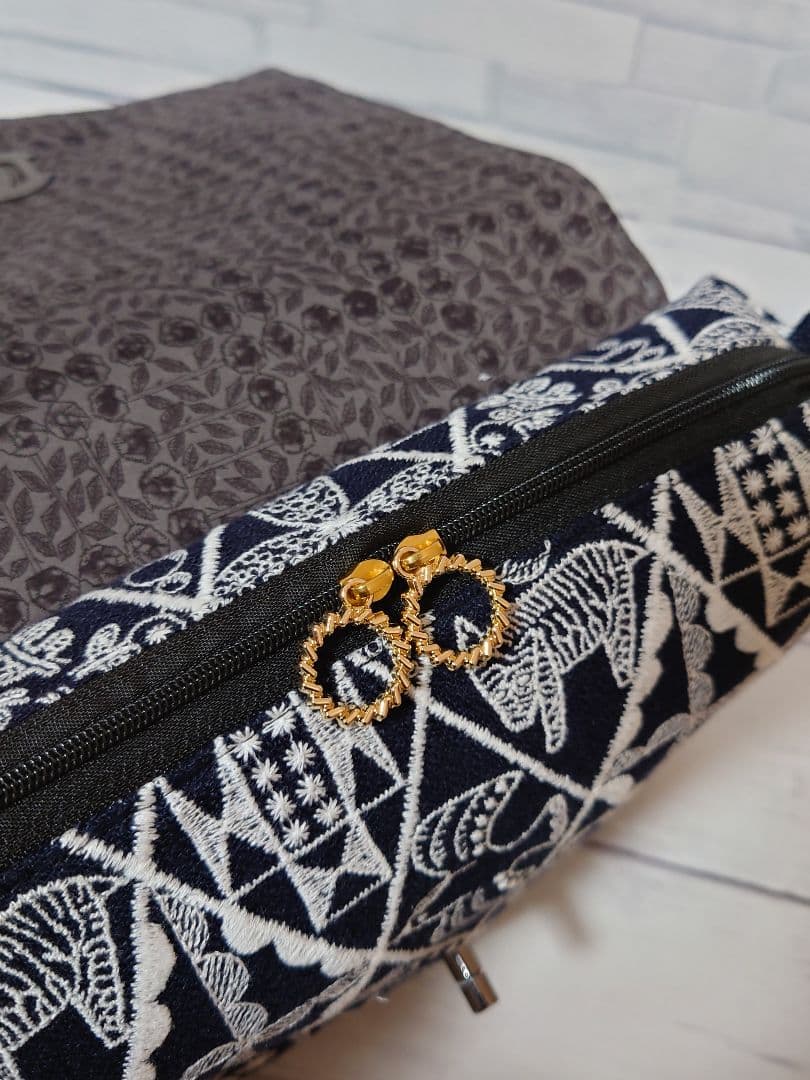 symphony navy ミナペルホネン　クラッチバッグ