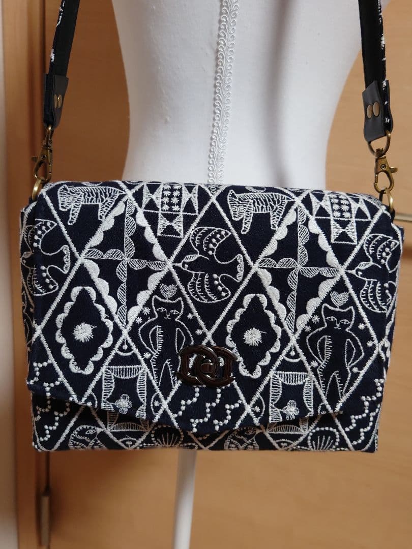 symphony navy ミナペルホネン　クラッチバッグ