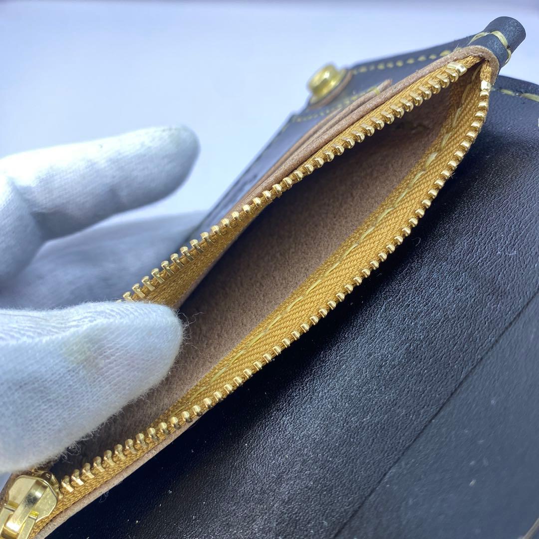 お札折らずに収納できる無骨な手染めミドルトラッカーウォレット BTW