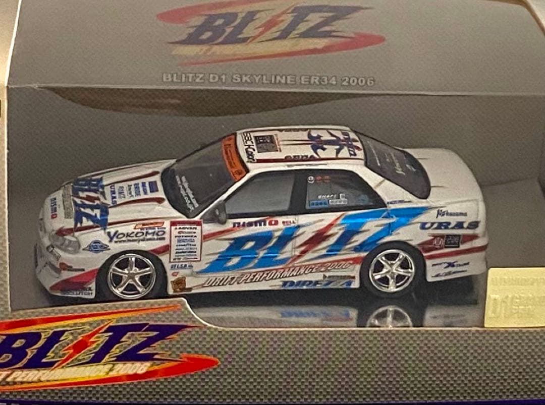 ミニカー BLITZ D1 SKYLINE ER34 2006 1/64