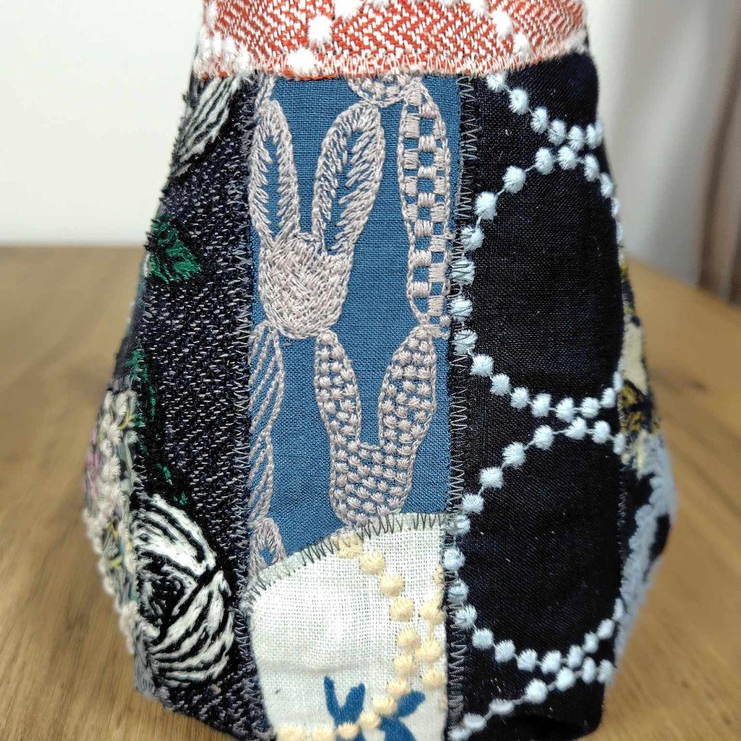 ミナペルホネン/牛革ブラック 猫ポーチカケラパッチ/背面牛革