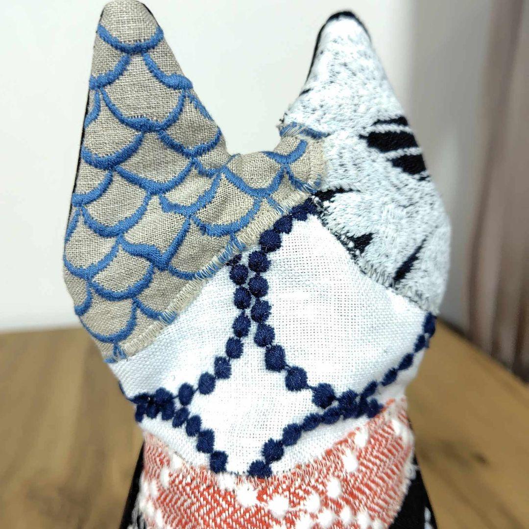 ミナペルホネン/牛革ブラック 猫ポーチカケラパッチ/背面牛革