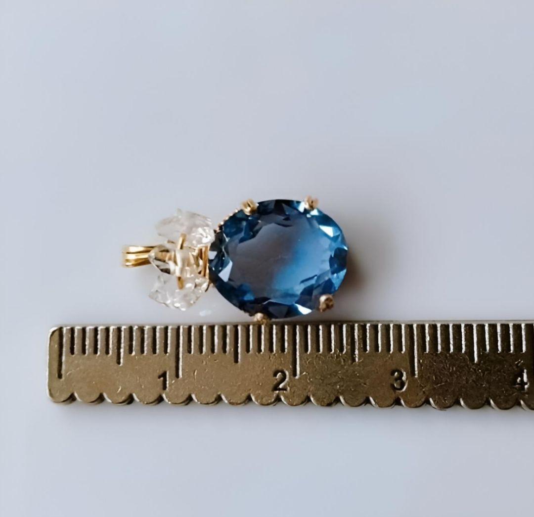 Kgf14 宝石ルース スイスブルートパーズ ファセット 爪留め ペンダント