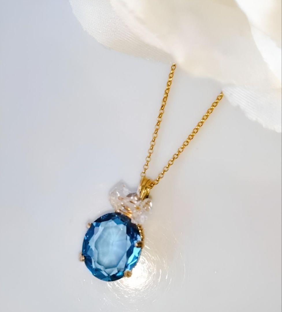 Kgf14 宝石ルース スイスブルートパーズ ファセット 爪留め ペンダント