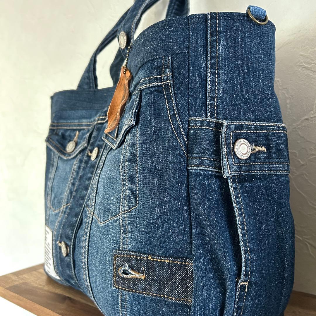 906.濃いめブルー　デニムリメイク サイドポケットトートバッグ　ジージャン