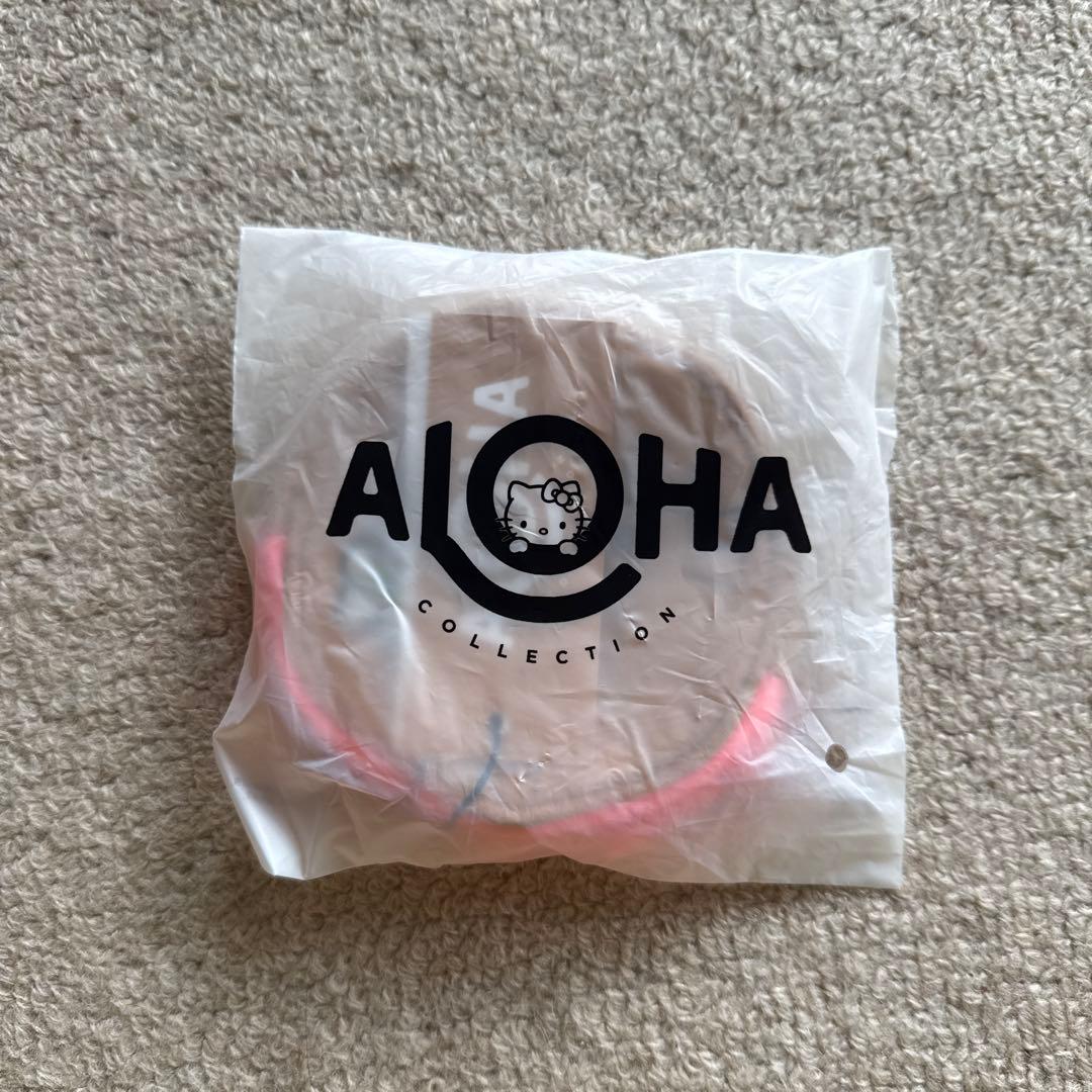 ALOHA COLLECTION CUTIE 日焼けキティ　丸型ポーチ