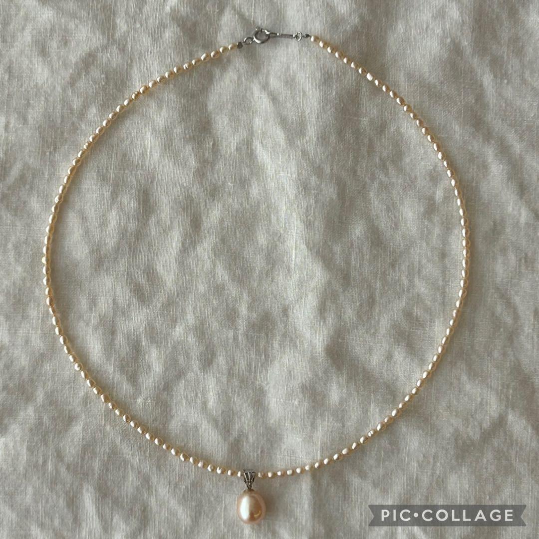 真珠ペンダント付きオレンジ色ライスパールネックレス