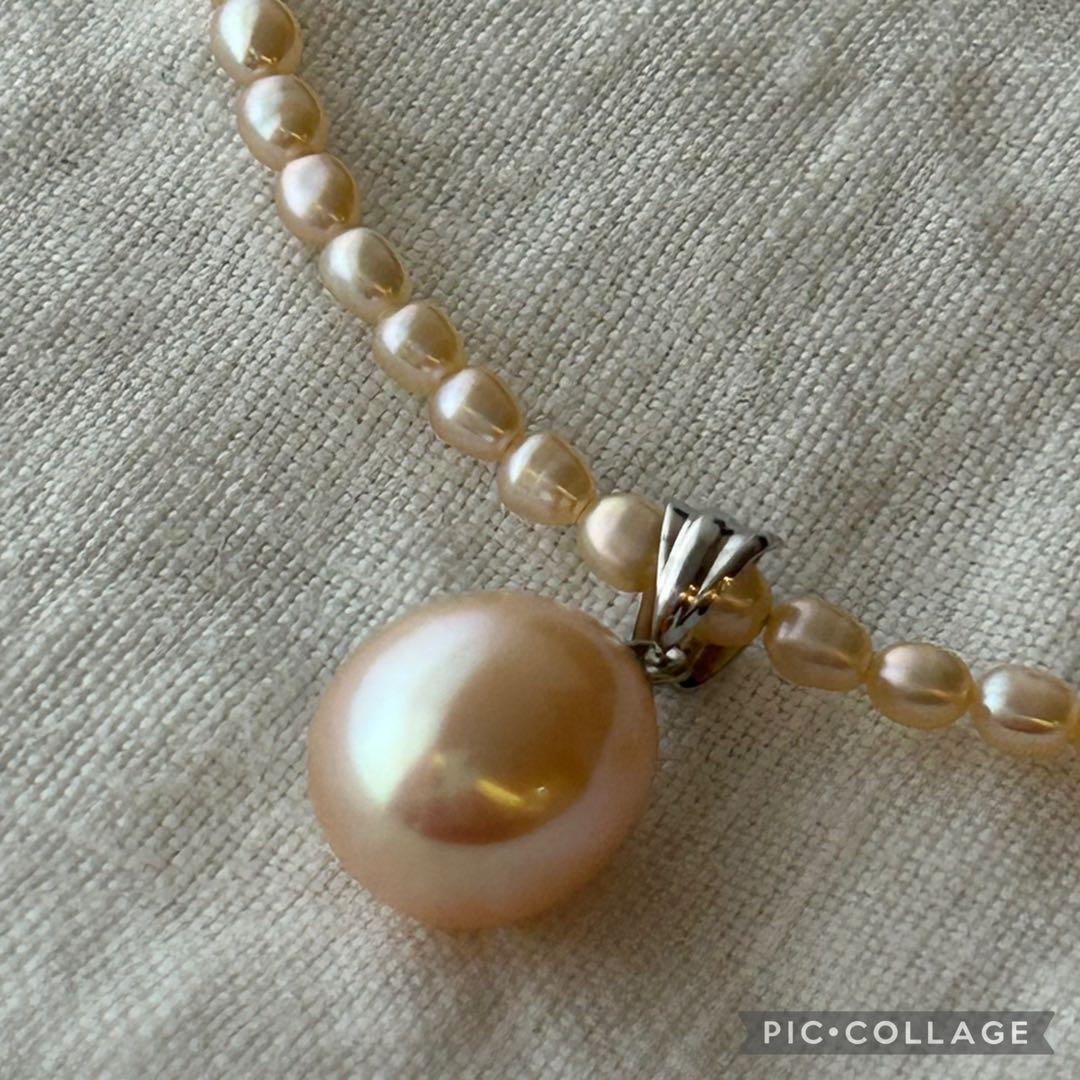 真珠ペンダント付きオレンジ色ライスパールネックレス