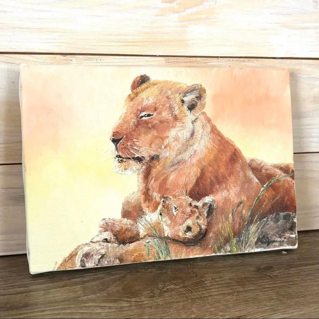 ライオンと子ライオンの油彩画