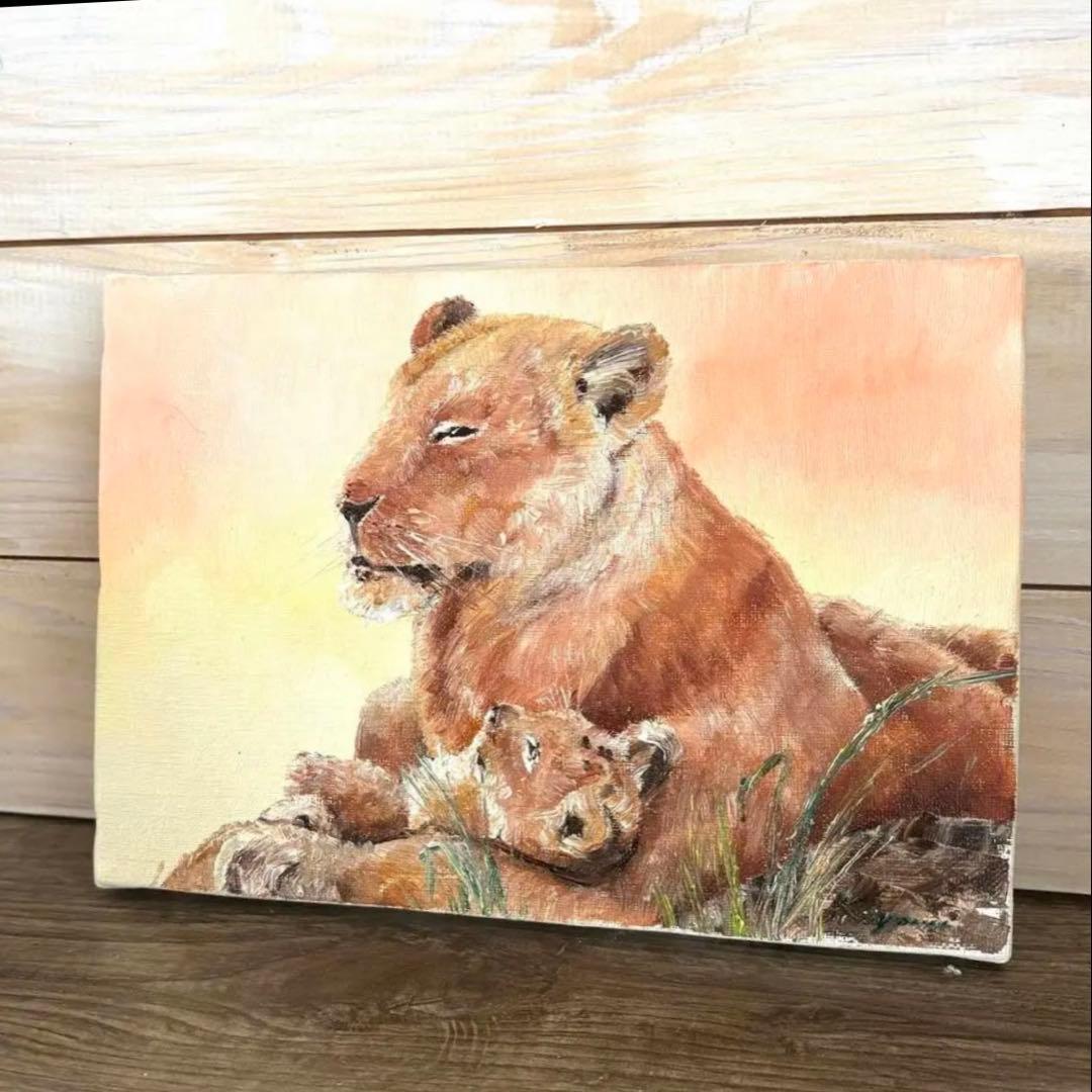 ライオンと子ライオンの油彩画