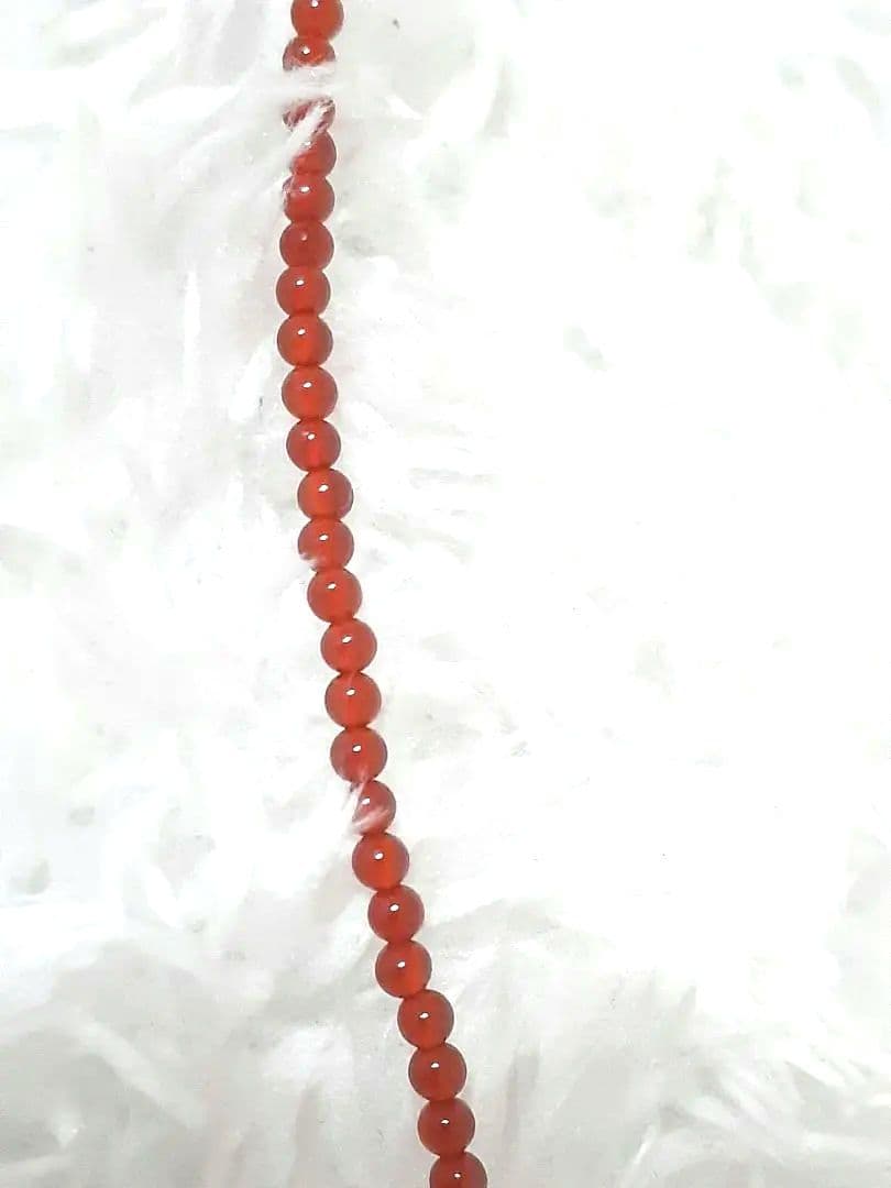 真っ赤なバラの琥珀のネックレス