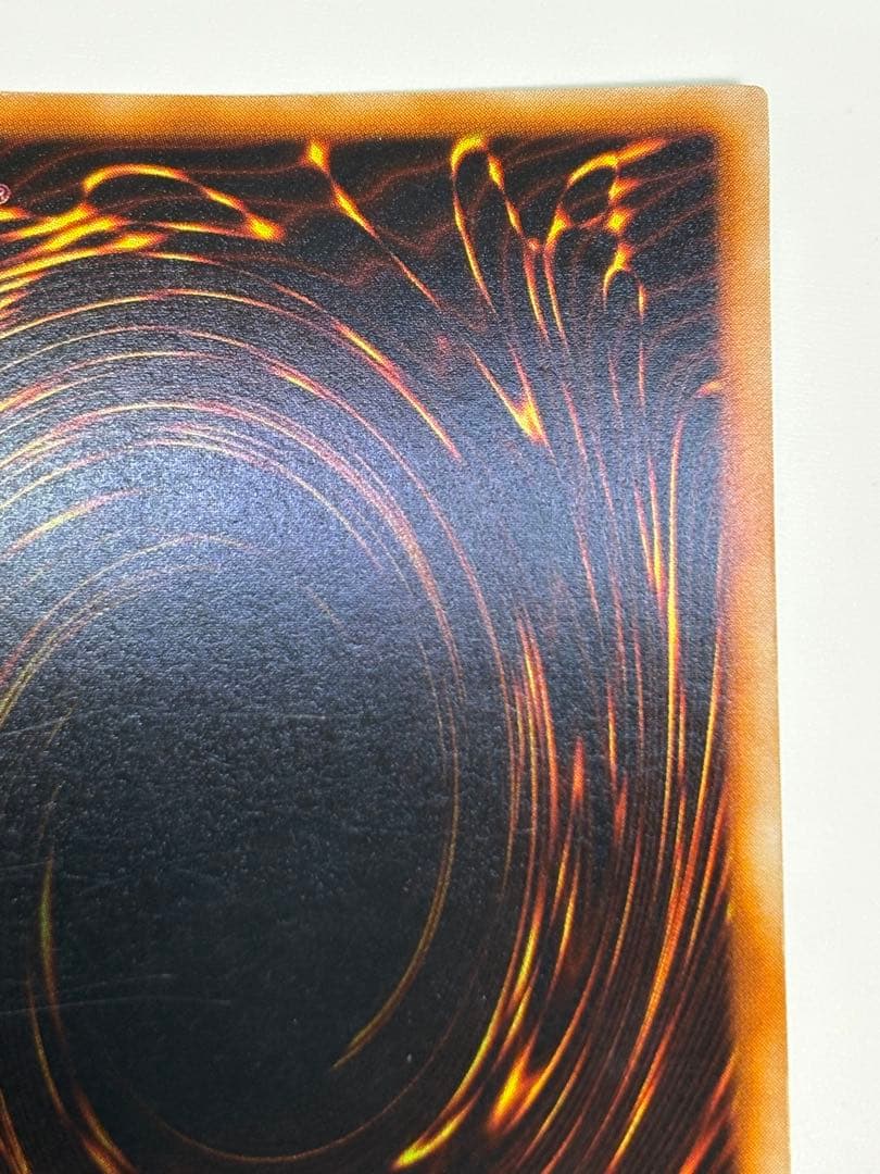 ②中古品みたいです。青眼の白龍 初期 ウルトラレア 遊戯王