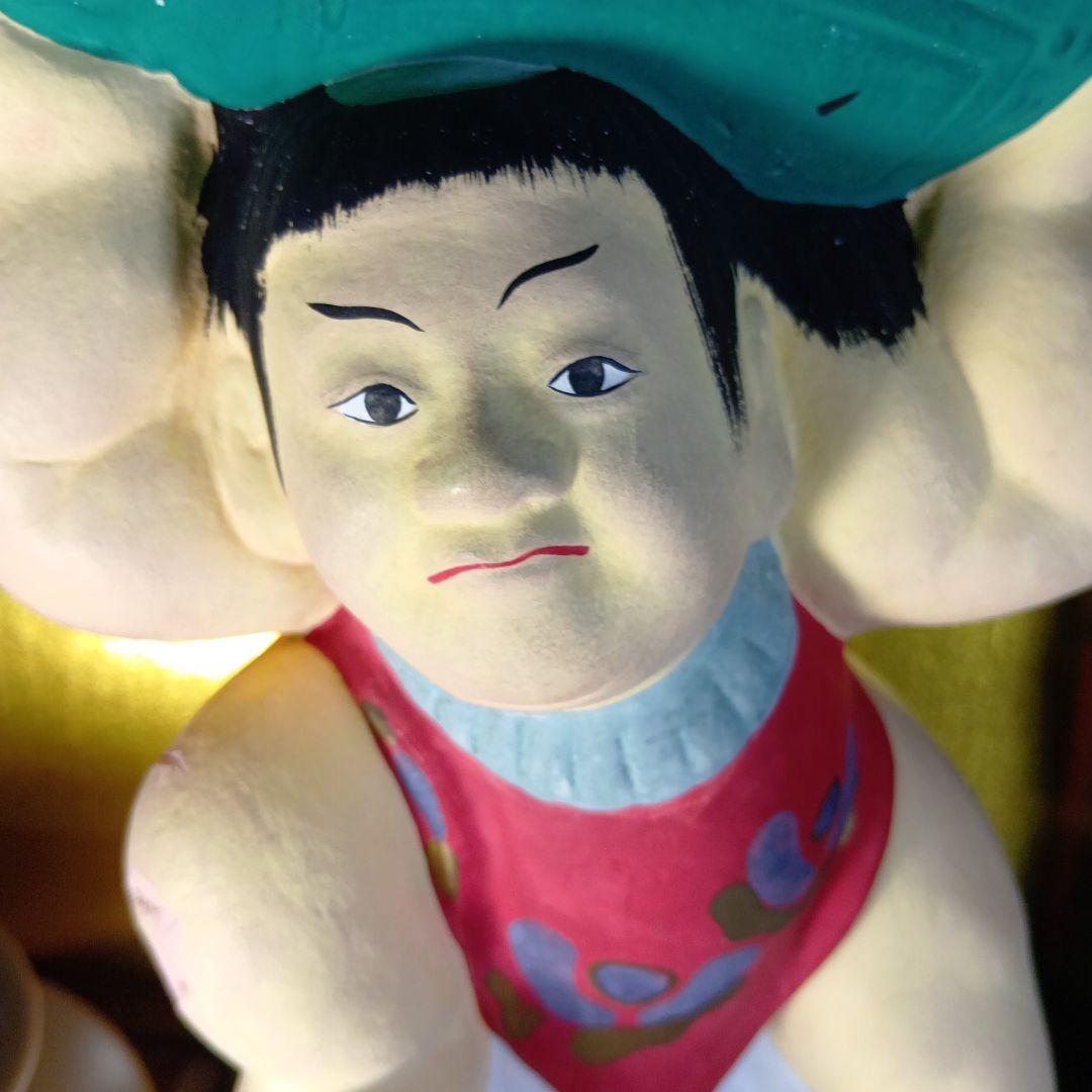 力士のフィギュア 青い桶