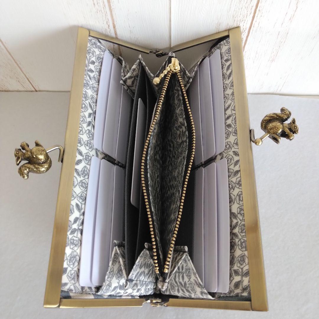 ミナペルホネン hanaco+choucho(グレー) リス浮足がま口長財布