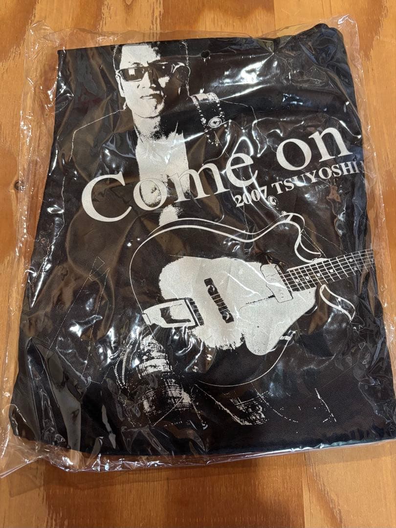 長渕剛ビニールバッグと飾り皿2枚のセットです。