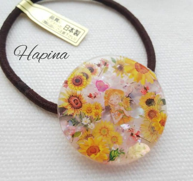 ひまわりガールラウンドレジンヘアゴム ポニーフック。