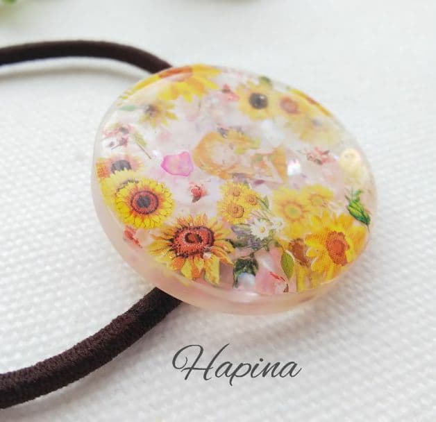 ひまわりガールラウンドレジンヘアゴム ポニーフック。