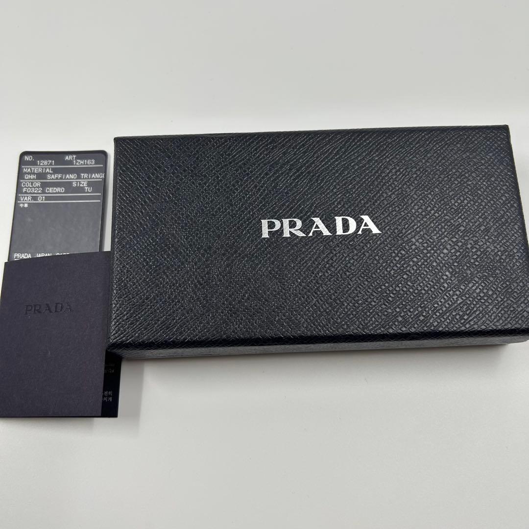 【PRADA】iPhone14pro用ケース 三角ロゴ サフィアーノレザー 黄色