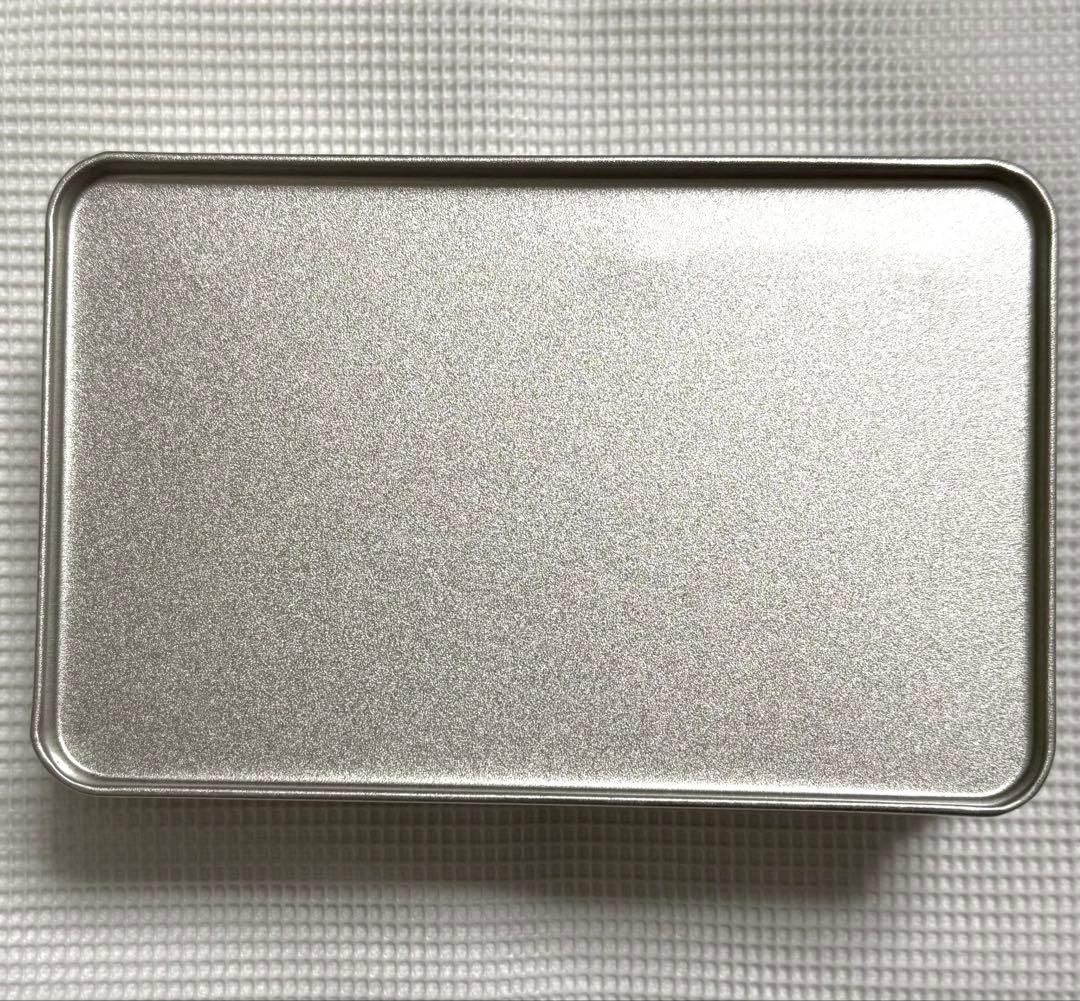 時光代理人 マルイコラボ メモ入り 缶ケース トキ ヒカル リン
