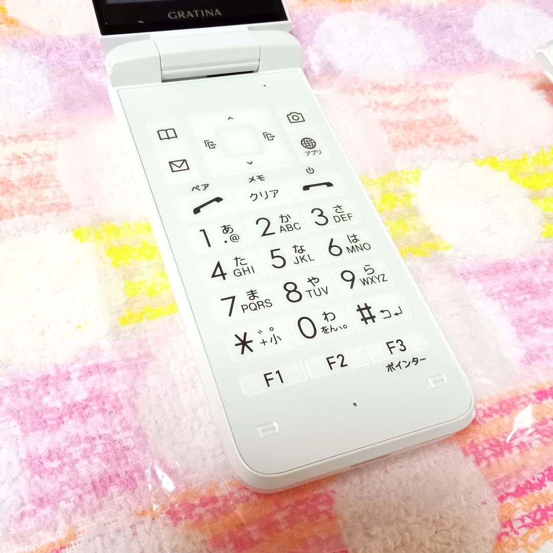 KYF42 GRATINA white 充電器セット 安心のメルカリ便 匿名配送