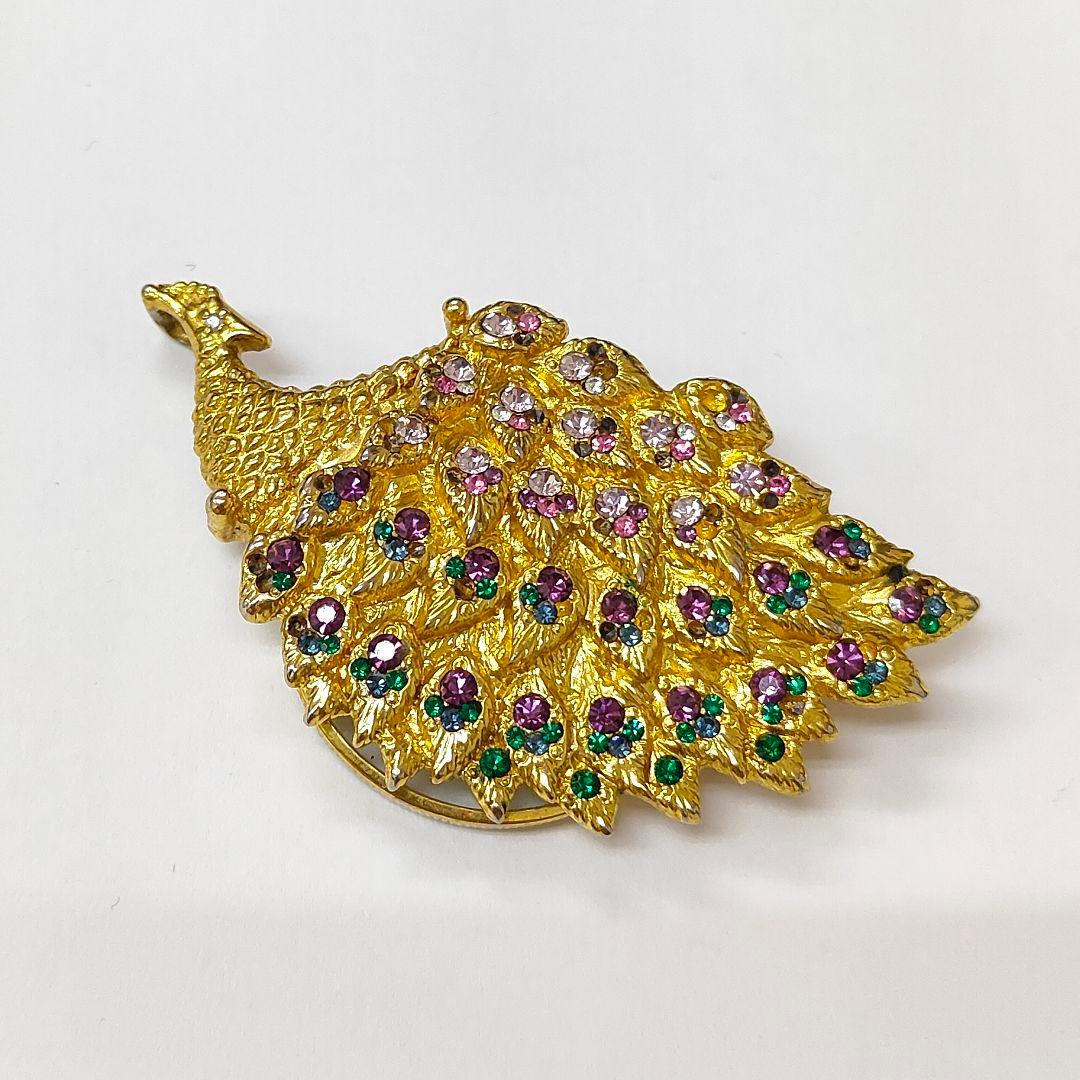 ゴールドトーン ルーペ付きペンダント