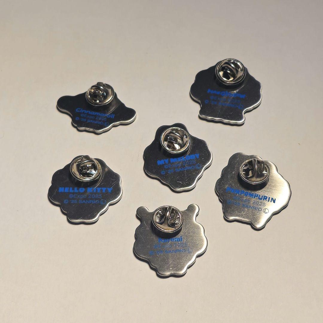 サンリオ x ミャクミャク　関西万博2025 ピンバッジ 7個セット