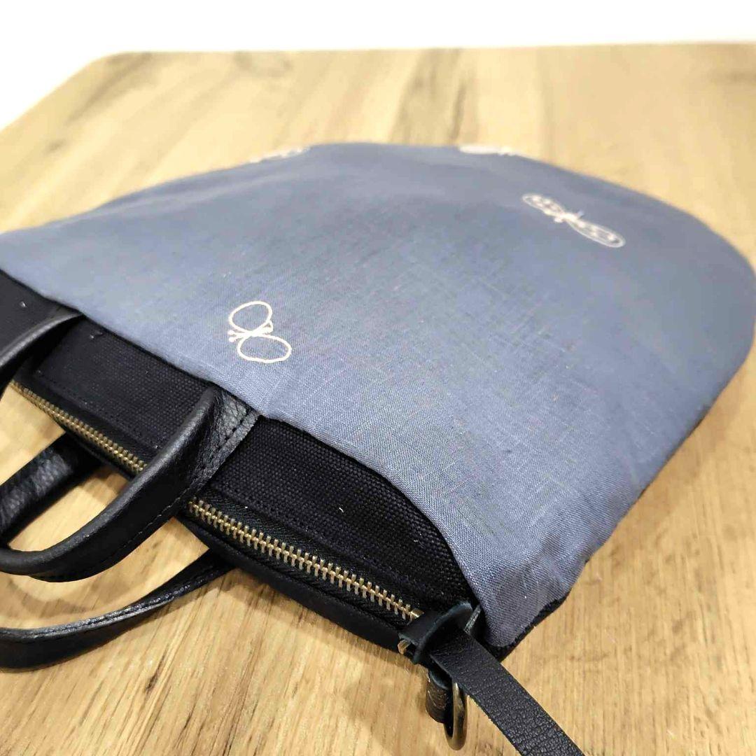 ミナペルホネン/cyoucyoちょうちょ/ロングミニラウンドショルダー本革黒