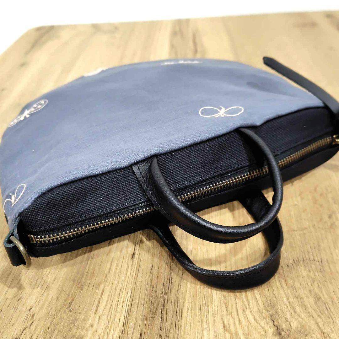 ミナペルホネン/cyoucyoちょうちょ/ロングミニラウンドショルダー本革黒