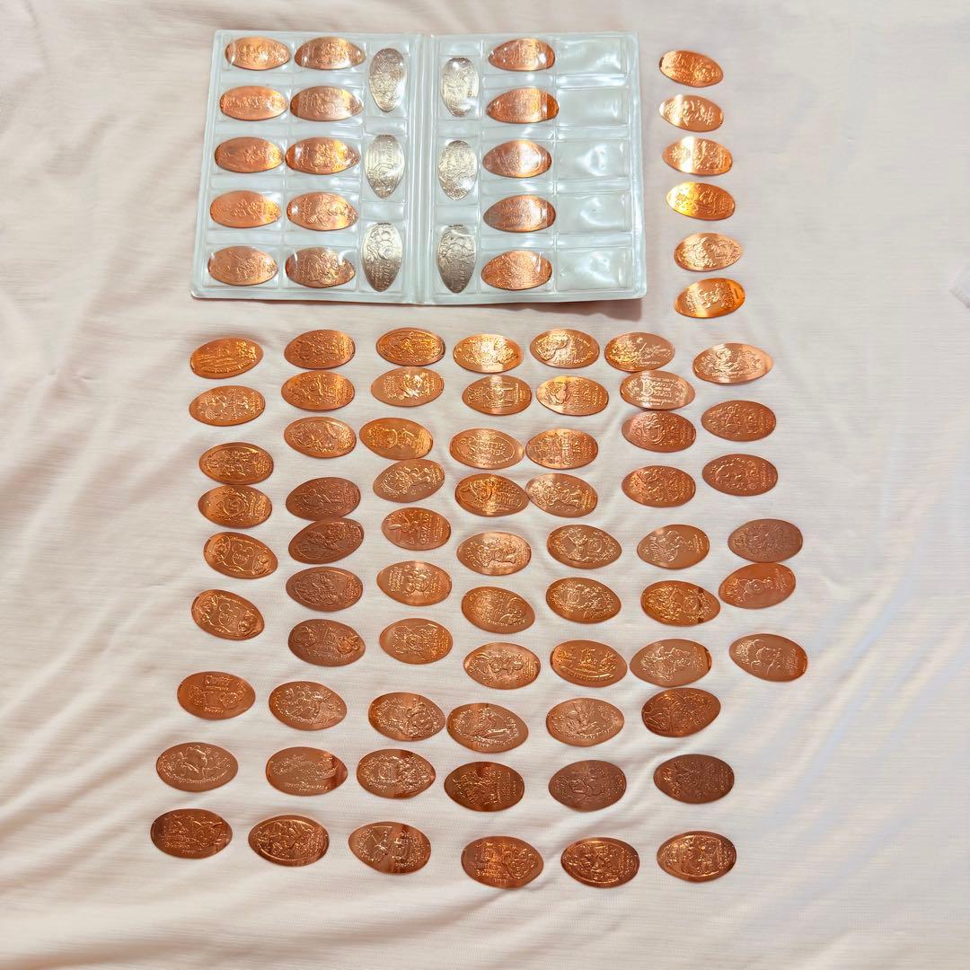 スーベニアメダル88枚&ディズニーランド20周年スーベニアブック付き