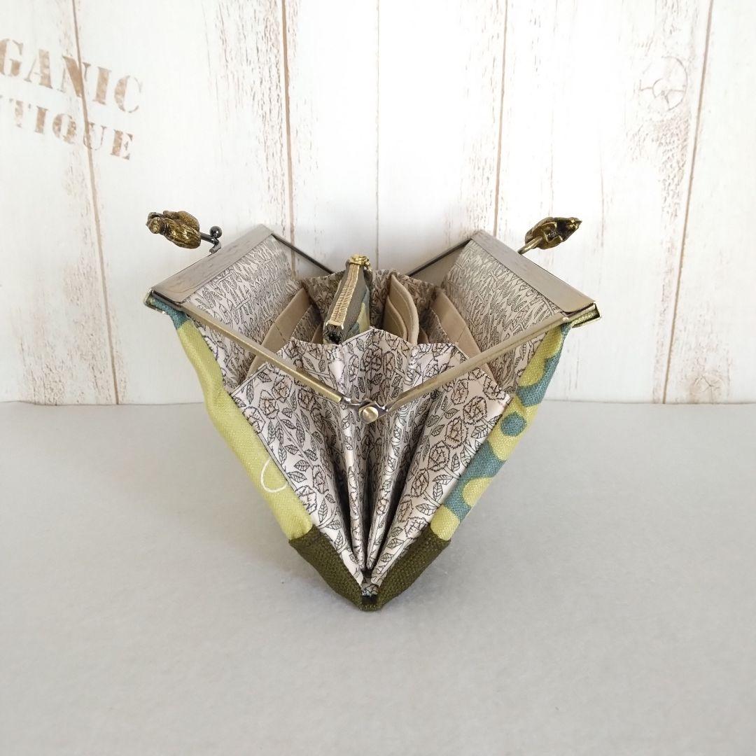 ミナペルホネン hanaco+choucho(カーキ) リス浮足がま口長財布