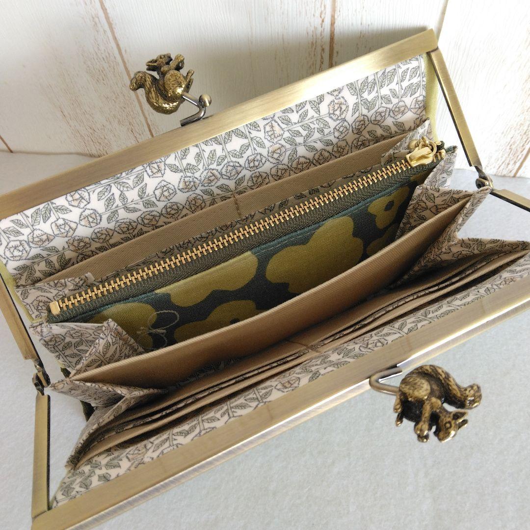 ミナペルホネン hanaco+choucho(カーキ) リス浮足がま口長財布