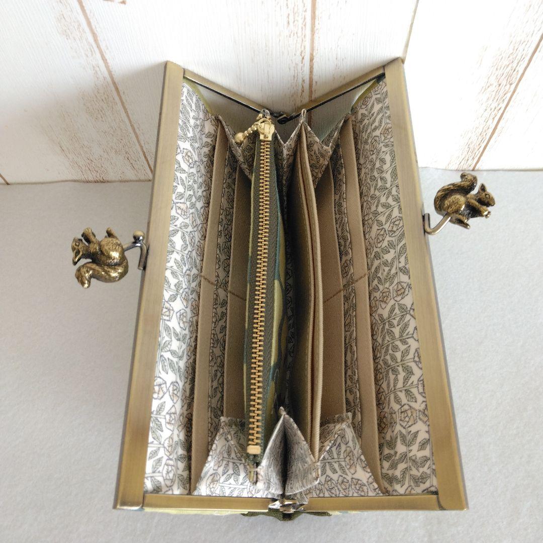 ミナペルホネン hanaco+choucho(カーキ) リス浮足がま口長財布