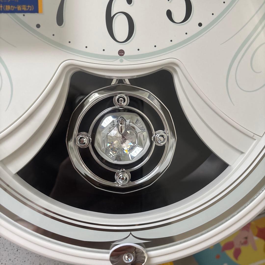 リズム時計 電波掛時計 スモールワールドリリィ 白 4MN528RH03