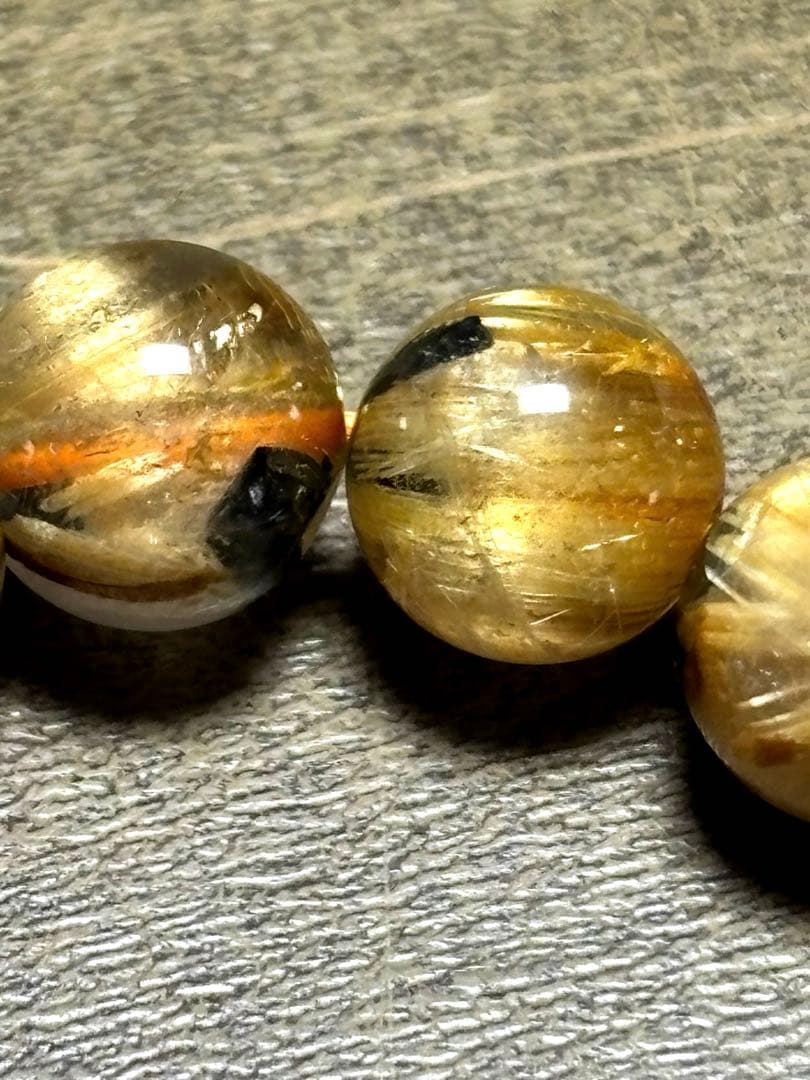 太陽放射タイチンルチル入りブレス7.3〜7.9㎜（新品未使用）キャッツアイ 金運