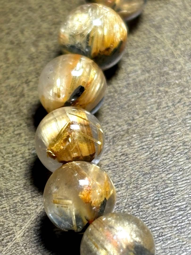 太陽放射タイチンルチル入りブレス7.3〜7.9㎜（新品未使用）キャッツアイ 金運